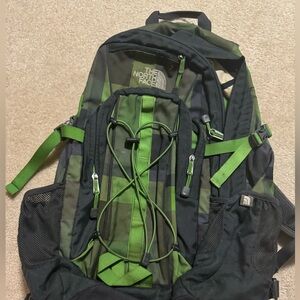 North face used green heckler backpack